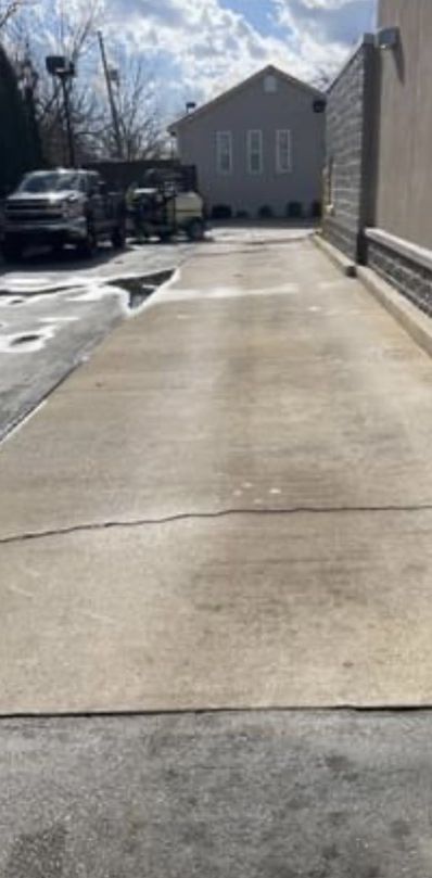 Clean commercial driveway after pressure washing