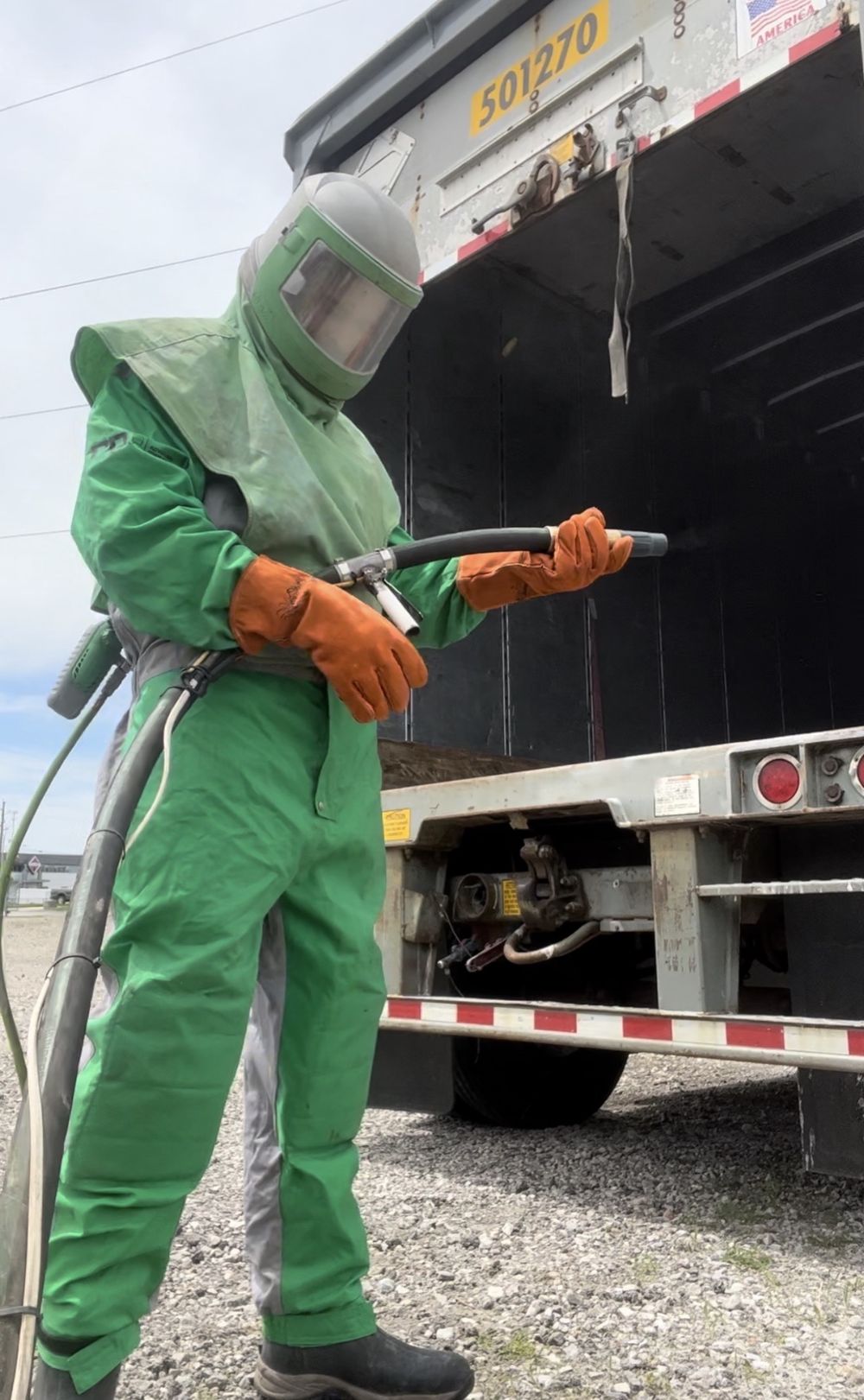 Mobile sandblasting a semi trailer